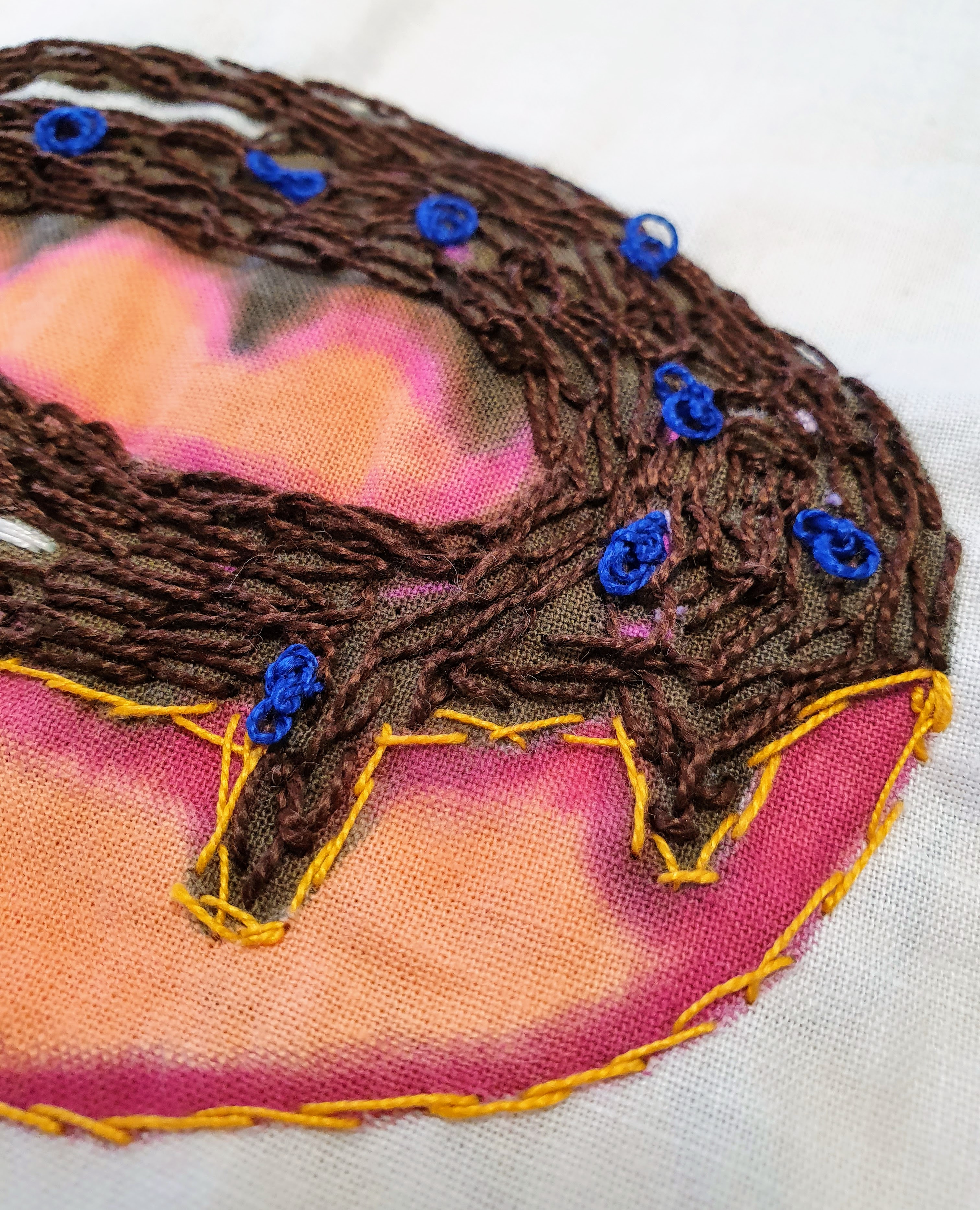 Hand embroidery art - donut close up