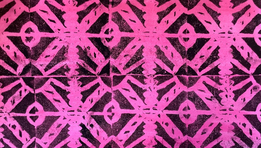 A vibrant print showcasing a geometric pattern with black  shapes set against a pink background, emphasizing texture and repetition.