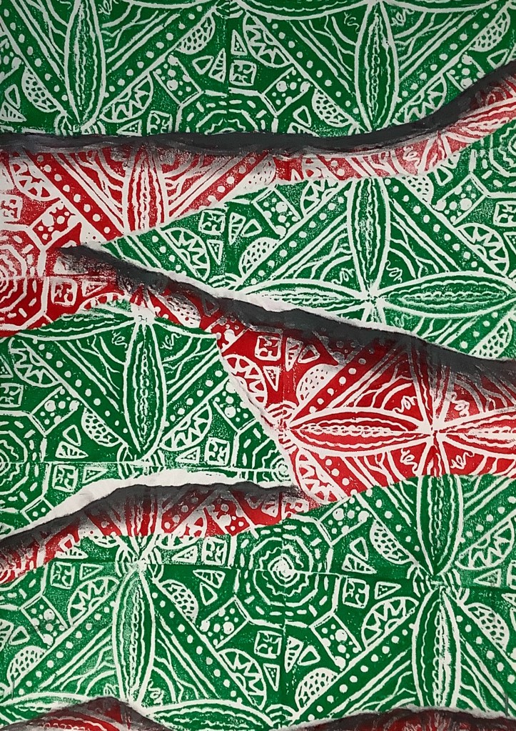 Close-up of a textured print featuring intricate green and red patterns with a ripped effect.