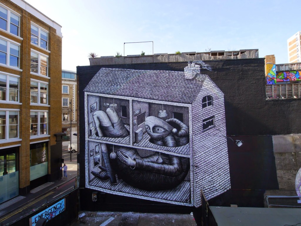 A large-scale mural by Phlegm depicting a whimsical house divided into sections, each featuring surreal characters in various poses, rendered in detailed black and white line work.