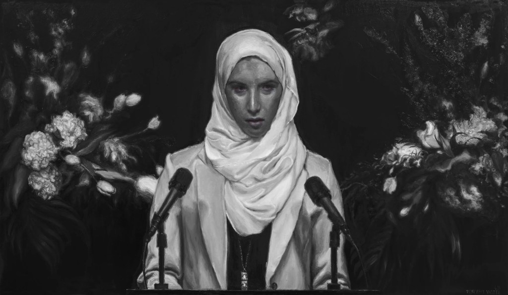 A woman wearing a white hijab stands at a podium with two microphones, surrounded by dark floral arrangements in a black and white setting. Vincent Valdez - dream baby dream