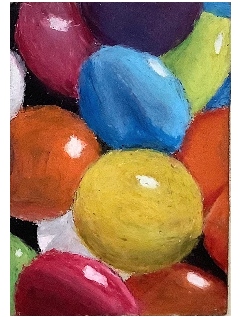 A close-up view of colorful oil pastel glossy candies arranged haphazardly, featuring shades of red, purple, blue, green, yellow, and orange on a black background.